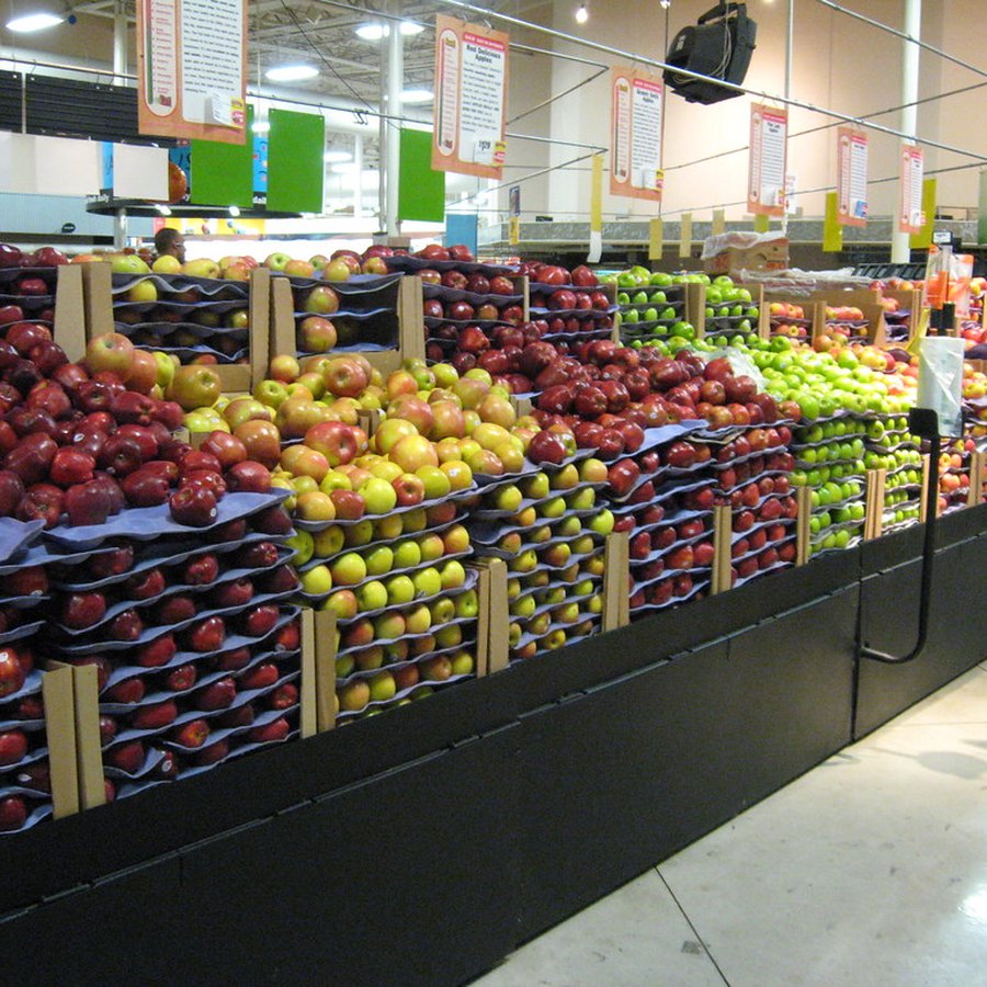 Träback med äpplen, päron och citrusfrukter för partihandel
